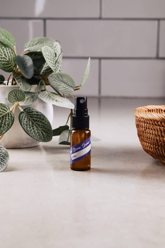 Homemade shower spray on the kitchen counter.