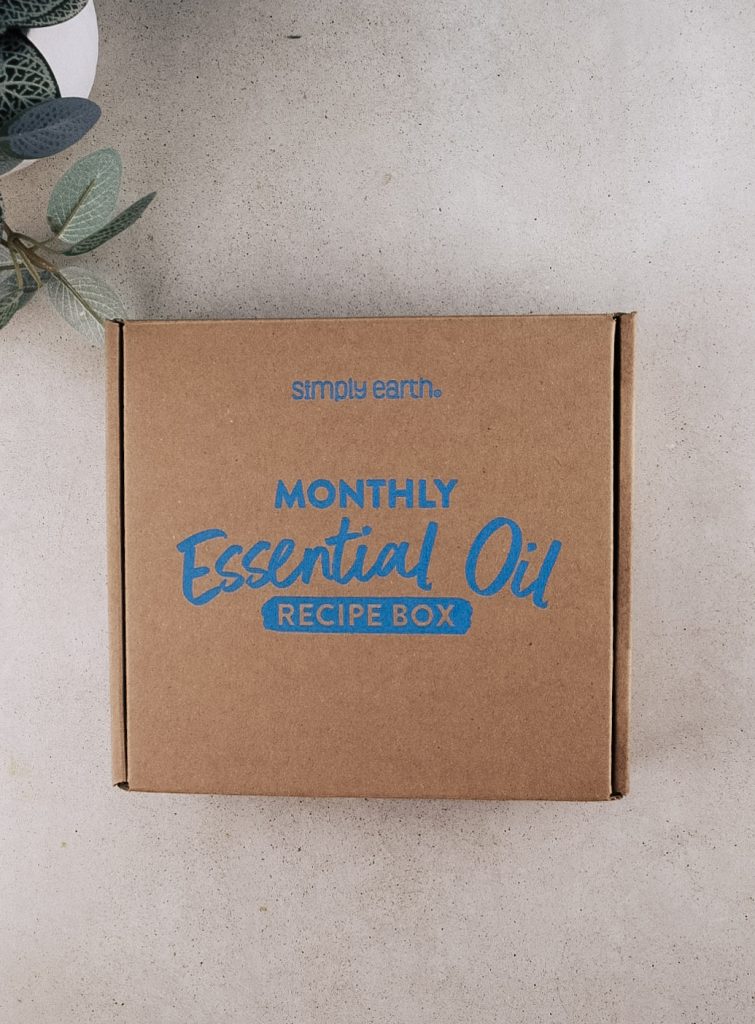 The Simply Earth August 2025 box is on the kitchen counter.