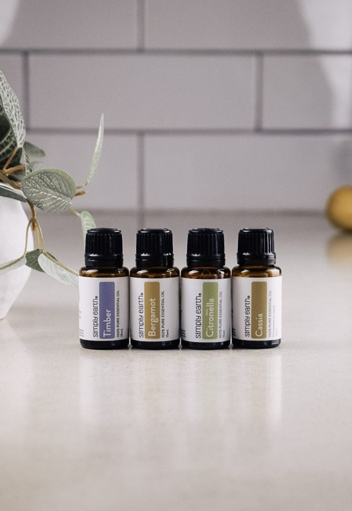 Essential oils from the Simply Earth August 2025 box are on the kitchen counter.